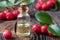 A bottle of wintergreen essential oil with fresh Gaultheria procumbens twigs