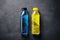 Bottles of blue and yellow Isotonic energy drink