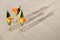 Bottles with calendula flowers for cosmetics, natural medicine, essential oils or other liquids on textured background