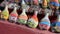 Bottles with Colorful Sand in Them with Little Sand Camels, Dubai, UAE