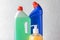 Bottles of detergents on light background