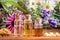 Bottles of essential oil with echinacea, chamomile, lavender