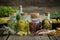 Bottles of infusion of healthy medicinal herbs and healing plants on wooden board. Herbal medicine