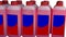 Bottles of liquid for cleaning a car\'s windscreen