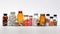 Bottles of medical pills on white background