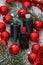 Bottles of nail polish in New Year's colors: red, white and green. Materials for manicure and pedicure in a beauty salon