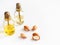 Bottles with oil argan nuts. Cosmetic means. Food product. Jar with argan oil on the background