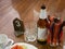 Bottles of opened beer and water in a Khantok dinner, Northern Thai style meal which people sit and eat on a floor