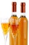 Bottles of passito wine with wine glasses