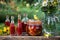Bottles of red oil made from St. John`s wort flowers, outdoors