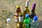 Bottles on sand, close-up