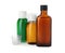 Bottles of syrups with measuring cups on white background. Cough and cold medicine