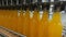 Bottling lemonade at the factory. Production of beverages - carbonated lemonade, in plastic bottles.