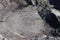 The bottom of the Active crater of Gorely volcano with a dried up, covered with ice acid lake, Kamchatka Peninsula