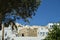 Bottom Shot Of The Houses On The Slope And The Serpentine Streets Of Pyrgos Kallistis On The Island Of Santorini. Travel, Cruises,