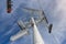 Bottom up overhead view of big metal pillar with Ski lift ropeway crossroad intersection on hilghland alpine mountain winter