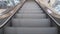 Bottom View of the Empty Escalator Steps Moving Up in a Shopping Center