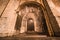 bottom view of entrance to Santa Maria Maior de Lisboa Cathedral in Lisbon at night