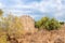 Bottom view of the hill with ruins of the round tower of the medieval fortress of Nimrod - Qalaat al-Subeiba, located near the