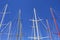 Bottom view of masts of yachts