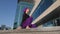 Bottom view muslim young girl islamic pensive woman wearing hijab and purple pants barefoot female lady sitting on