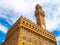 Bottom view of Pallazo Vecchio, Old Palace - Town Hall, with high bell tower, Piazza della Signoria, Florence, Tuscany