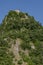 Bottom view of the Rock of Prayer of Roccaporena, Cascia, Italy, or Sacro Scoglio, on a sunny day