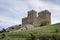 Bottom view of the tower of Genoese fortress of the 14th century in the Sudak bay on the Peninsula of Crimea