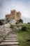 Bottom view of the tower of Genoese fortress of the 14th century in the Sudak bay on the Peninsula of Crimea