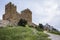 Bottom view of the tower of Genoese fortress of the 14th century in the Sudak bay on the Peninsula of Crimea