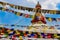 Bouddhanath stupa and colorful buddhist flags