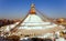 Boudha, bodhnath or Boudhanath stupa with prayer flags, the biggest buddhist stupa in Kathmandu city - buddhism in Nepal