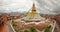 Boudhanath Stupa and Adjacent Buildings in Kathmandu of Nepal against Cloudy Sky from above