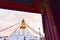 Boudhanath Stupa During Sunset from a Window in Kathmandu