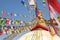 Boudhanath stupa - symbol of Nepal, with colorful prayer flags. Travel.