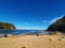 Boudi national park beach with blue clear sky surrounding sea