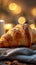 Boulangerie delight Croissant, cup on table against bokeh breakfast backdrop