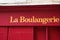 Boulangerie french sign means bakery old vintage on street outside view of rustic text on wall wooden facade