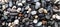 boulder pebble beach stones background seamless texture for design use