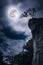 Boulders against sky with cloudy and beautiful full moon.