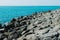 Boulders and breakwaters on the seashore. Shore strengthening.