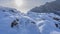 The boulders are covered with a layer of pure untouched snow.