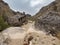 Boulders and Gravel Fill the Strawhouse Wash Trail