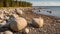 Boulders on the Gulf of Finland shore near Kasmu village in northern Estonia. Classic Baltic seascape. Sunny. Copy