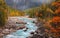 Boulders and rocks in fresh water stream at rural British Columbia in autumn time