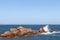 Boulders and surf on the Pink Granite Coast in Brittany