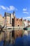 Boulevard on the Motlawa River, gothic Mariacka gate, reflection in the water, Gdansk, Poland