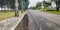 Boulevard with no U-turn sign , foot path and water logged.