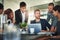 Bouncing some ideas around. Shot of a group of businesspeople meeting in the boardroom.