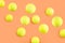 Bouncing tennis ball pattern on orange